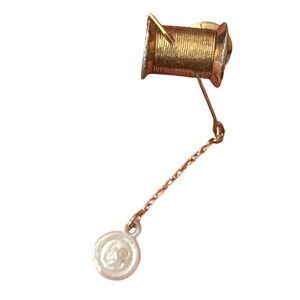 Vintage Avon Gold Tone Spool of Thread Needle and Button Dangle Lapel Pin 1983